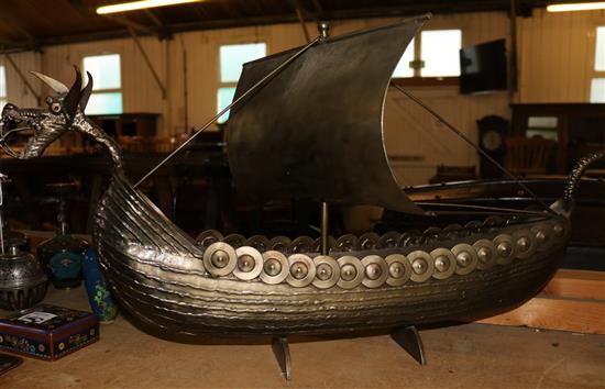 Brass model of a longboat